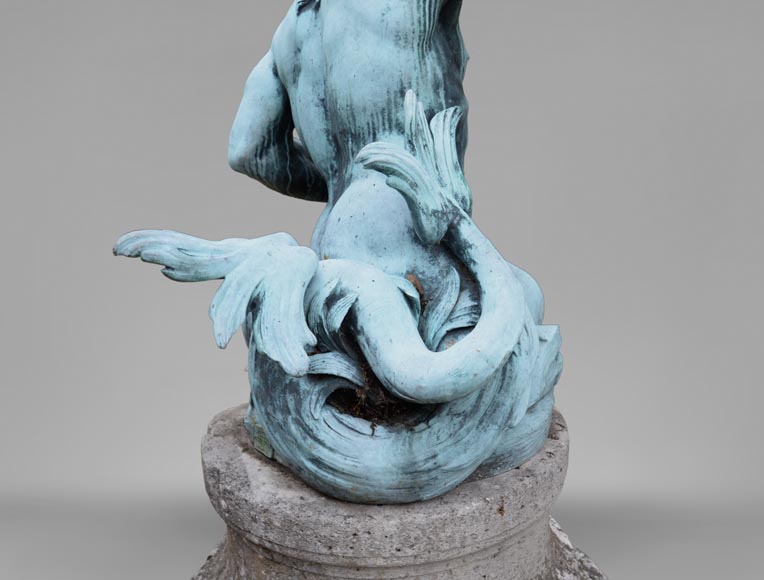 Important Louis XIV style pair of Tritons sounding a conch shell in bronze with green patina_fr