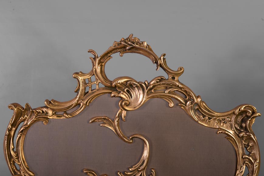 Pare-étincelles au Cupidon de style Louis XV, en bronze poli verni, années 1970-1