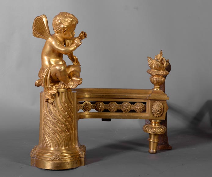 BOUHON Frères - Paire de chenets de style Louis XVI aux putti-1