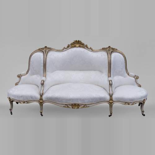 Grande banquette ancienne de style Louis XV en bois doré