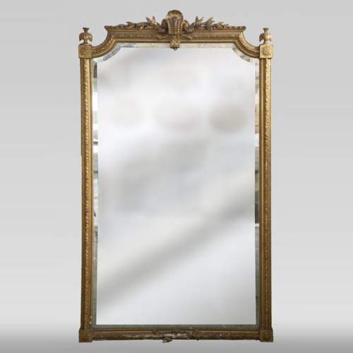 Trumeau ancien doré, de style Napoléon III, au miroir biseauté