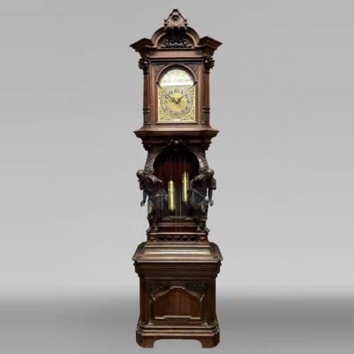 JULIUS GROSCHKUS (actif dans la seconde moitié du XIXe siècle), Horloge de parquet en acajou à décor exotique