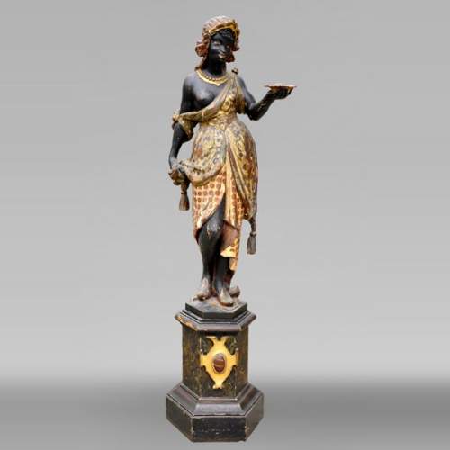 Nubienne porte-torchère en bois polychrome sculpté et doré