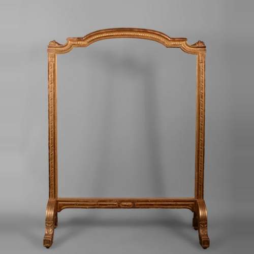 Rare pare-étincelles ancien en bois et stuc doré de style Louis XVI