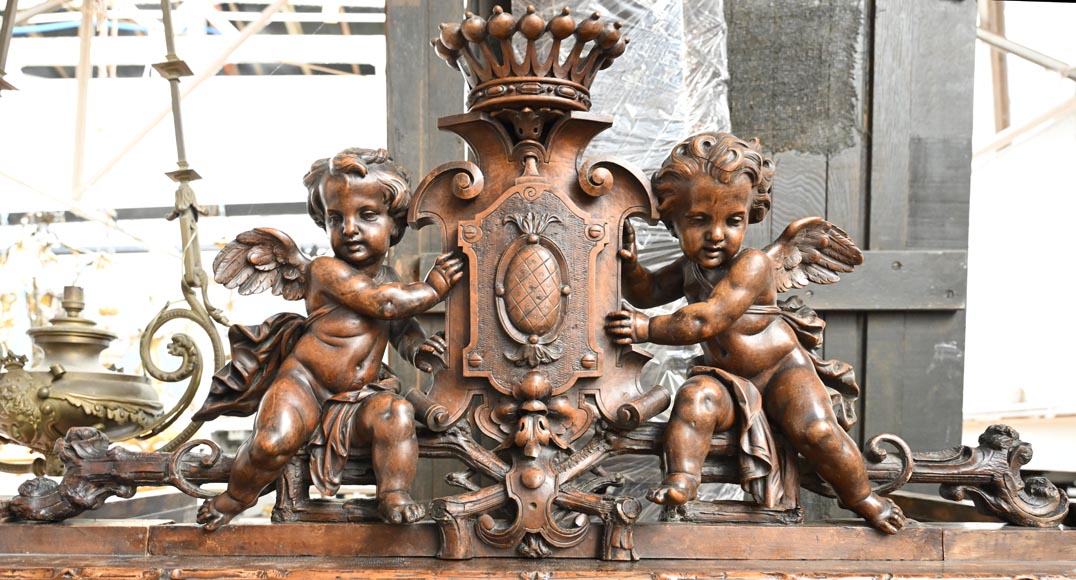 TAHAN (attribué à) — Importante armoire à glace en noyer sculpté à décor naturaliste TAHAN (attribué à) — Importante armoire à glace en noyer sculpté à décor naturaliste-1