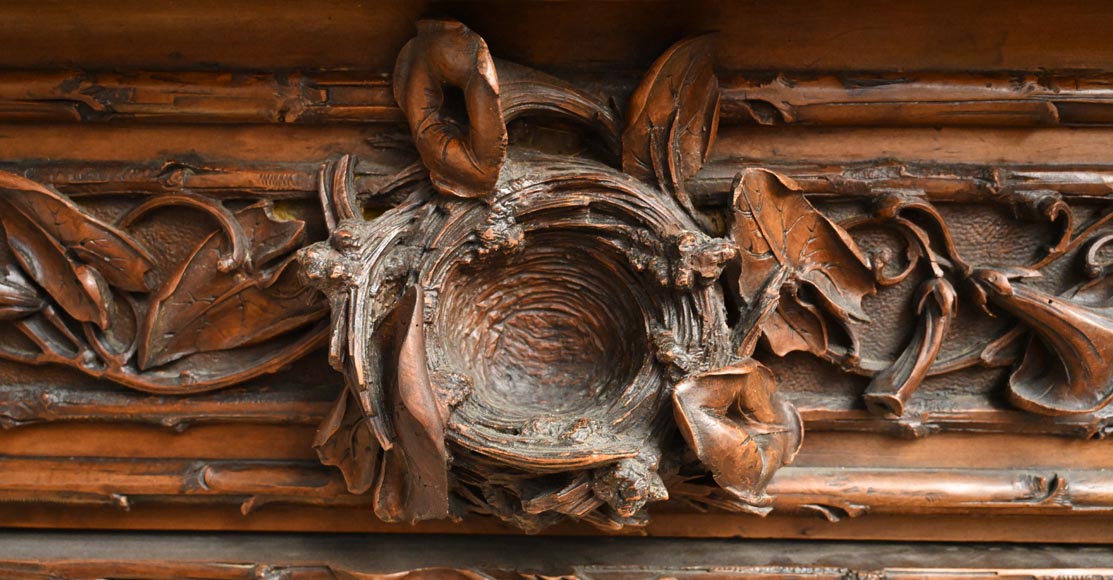 TAHAN (attribué à) — Importante armoire à glace en noyer sculpté à décor naturaliste TAHAN (attribué à) — Importante armoire à glace en noyer sculpté à décor naturaliste-2