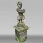 Statue d'un jeune faune musicien en pierre composite, début du XXe siècle