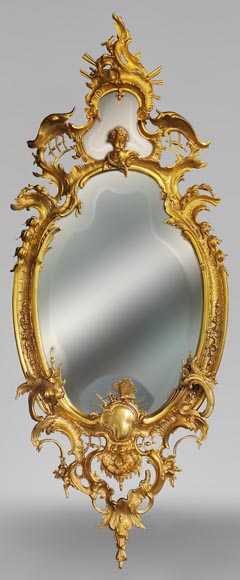 Miroir Napoléon III en bronze doré à très riche décor de rocaille