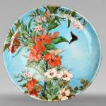 Théodore DECK, plat en faïence émaillée à décor d'hibiscus et de quisqualis
