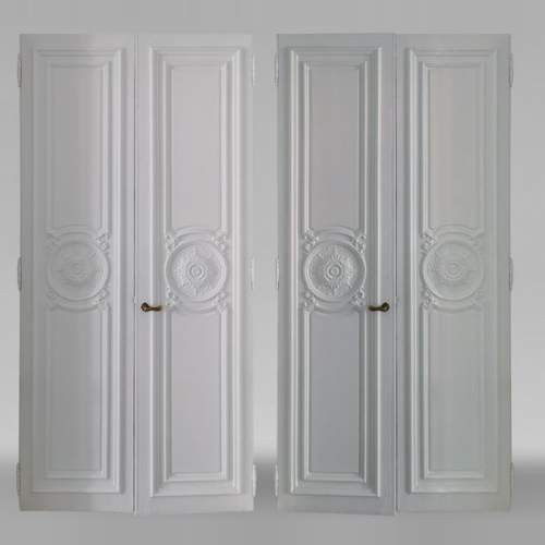Paire de doubles portes double face de style Régence ornées de rosaces