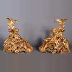 Paire de chenets Napoléon III en bronze doré représentant Vénus et Bacchus enfant 