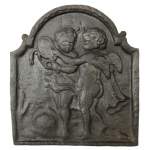 Plaque de cheminée au putti et miroir