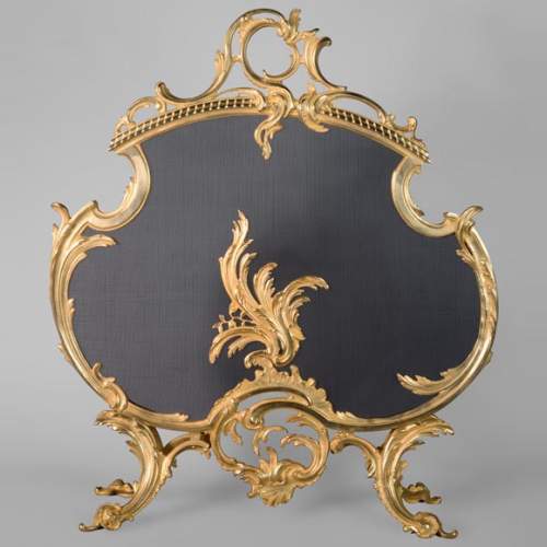 Pare-étincelle de style Louis XV en bronze doré au décor végétal