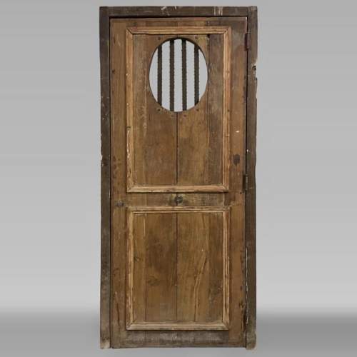 Petit porte ancienne simple en chêne avec ouverture ovale