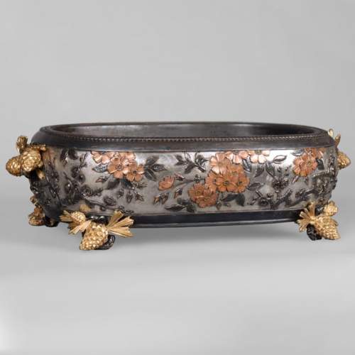 CHRISTOFLE - Exceptionnelle jardinière en cuivre galvanique  à décor partiellement cuivré, doré, argenté et patiné sur fond argent, vers 1878