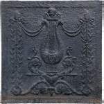 Plaque de cheminée d’époque Louis XVI à la lyre