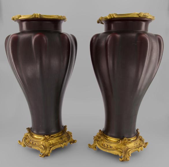 Eugène BAUDIN (att. à), Paire de vases en grès à monture de bronze doré-0