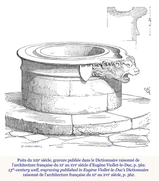 Puits doté d'une margelle à la tête de loup-1