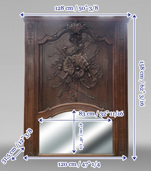 Trumeau en bois sculpté à décor de cornemuse-12