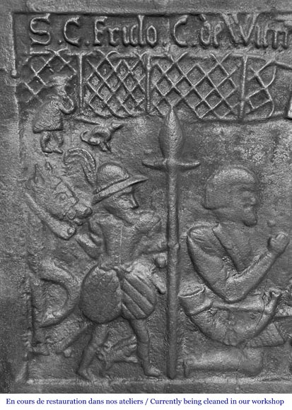 Plaque de cheminée en fonte représentant 