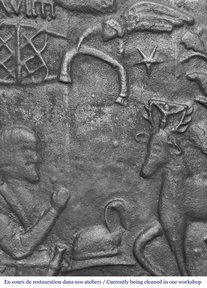 Plaque de cheminée en fonte représentant 