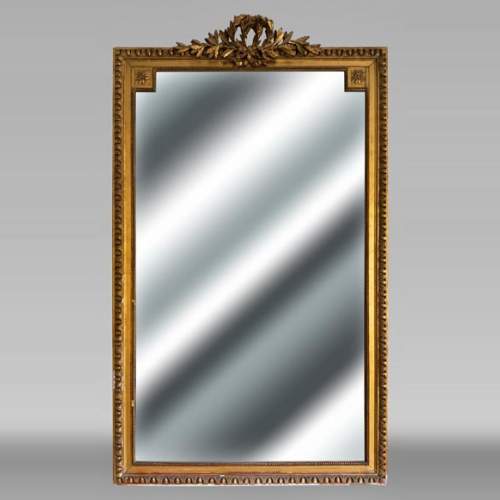 Trumeau de style Louis XVI décoré d'une double couronne de laurier