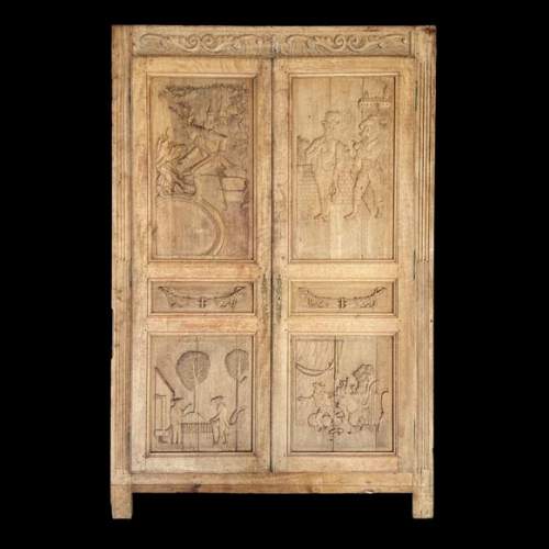 Importante boiserie en chêne sculpté à décor des Fables de La Fontaine