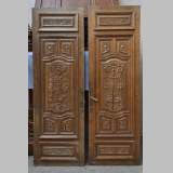 Fausse paire de portes anciennes en chêne sculpté du XIXè siècle
