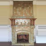 Belle cheminée Art Nouveau en céramique et noyer par Charles Gréber avec frise de travailleurs