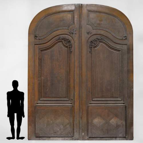 Importante et rare porte cochère d'immeuble Haussmannien en chêne, fin du XIXè siècle