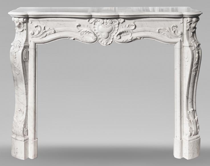 Cheminée de style Louis XV en marbre de Carrare richement décorée Cheminée de style Louis XV en marbre de Carrare richement décorée-0