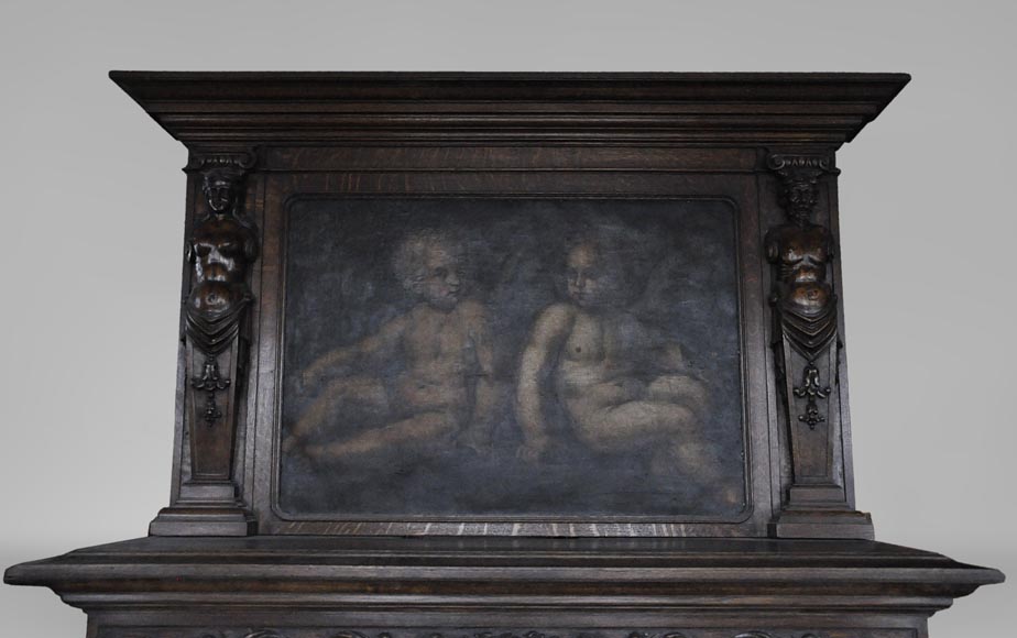 Cheminée ancienne de style Néo-Renaissance en chêne avec une peinture représentant deux putti-1
