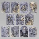 Ensemble de visages sculptés et d'éléments décoratifs en pierre de Soleil des Ardennes, fin du XIXe siècle