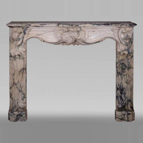 Cheminée ancienne de style Louis XV baroque en marbre Paonazzo
