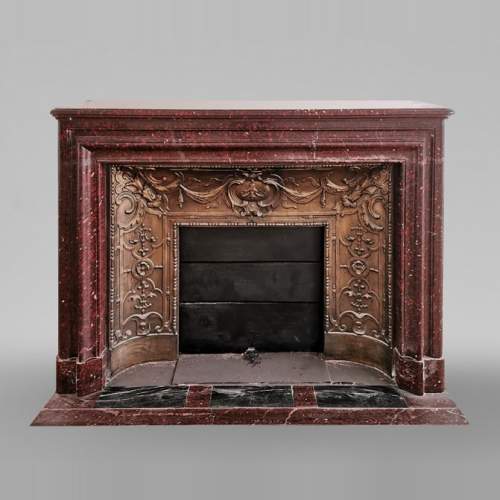 Grande cheminée ancienne de style Louis XIV en marbre Rouge Griotte