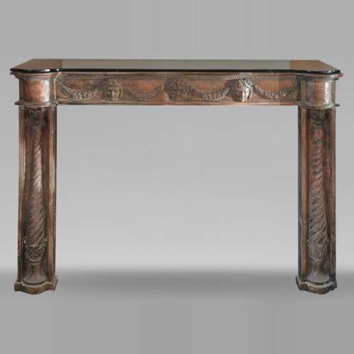 Rare cheminée en terre cuite de style Louis XVI à colonnes torses, début du XIXe siècle