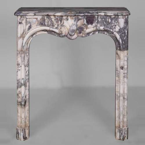 Petite cheminée d'époque Louis XV en marbre Brèche Violette