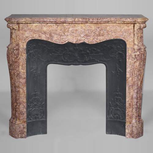 Cheminée de style Louis XV en marbre Brocatelle