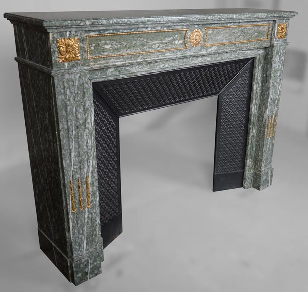 Cheminée de style Louis XVI en marbre vert d’Estours aux bronzes dorés-2