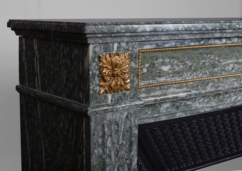 Cheminée de style Louis XVI en marbre vert d’Estours aux bronzes dorés-3