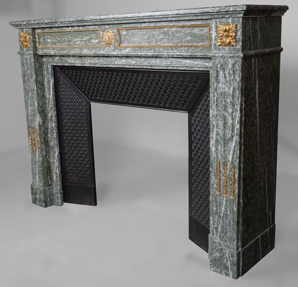 Cheminée de style Louis XVI en marbre vert d’Estours aux bronzes dorés-5