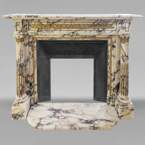 Cheminée de style Louis XVI en marbre Panazeau et bronze à colonnes détachées et cannelées