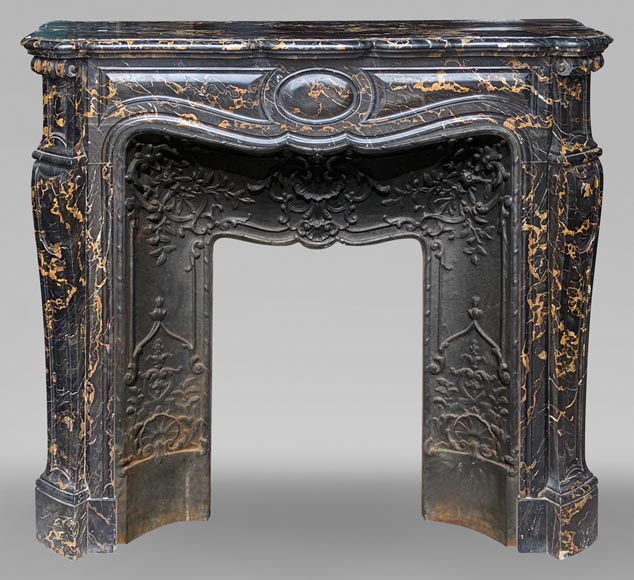 Cheminée de style Louis XV à marbre Portor-0
