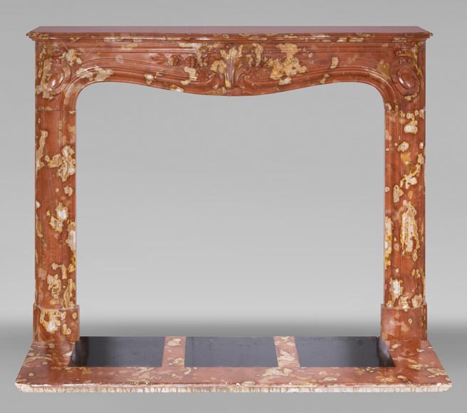 Jules CANTINI (attribué à), Cheminée de style Régence à palmette et enroulement, en marbre rouge de Vitrolles-0