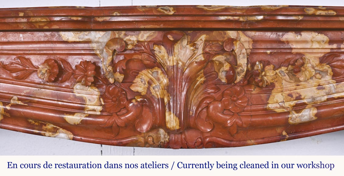 Jules CANTINI (attribué à), Cheminée de style Régence à palmette et enroulement, en marbre rouge de Vitrolles-1