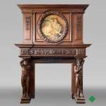 Grande cheminée monumentale en noyer sculpté, décorée d’atlantes et d’un médaillon peint