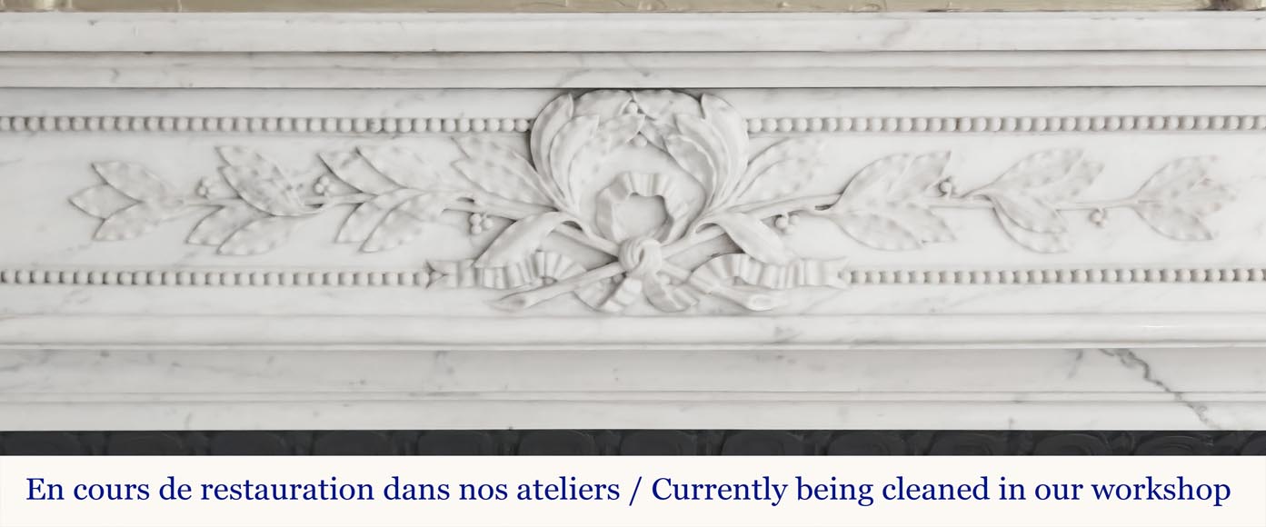 Cheminée galbée de style Louis XVI à décor de perlé, en marbre demi statuaire-1