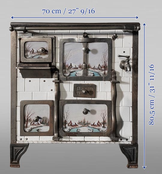 Cuisinière en fonte et imitation de faïence à décor de paysage enneigé-6