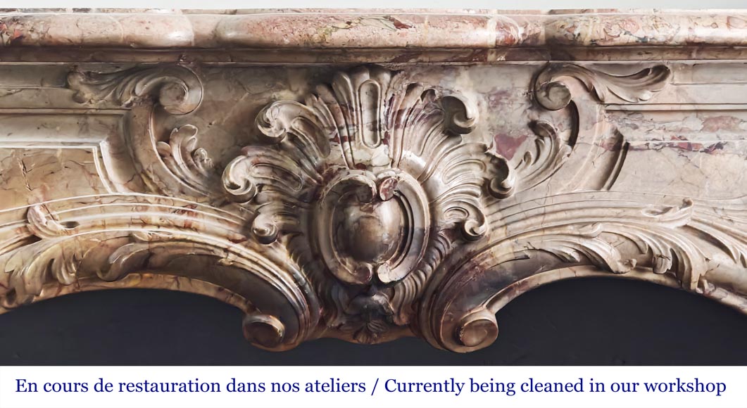 Cheminée de style Louis XV en marbre Sarrancolin très mouvementée-1