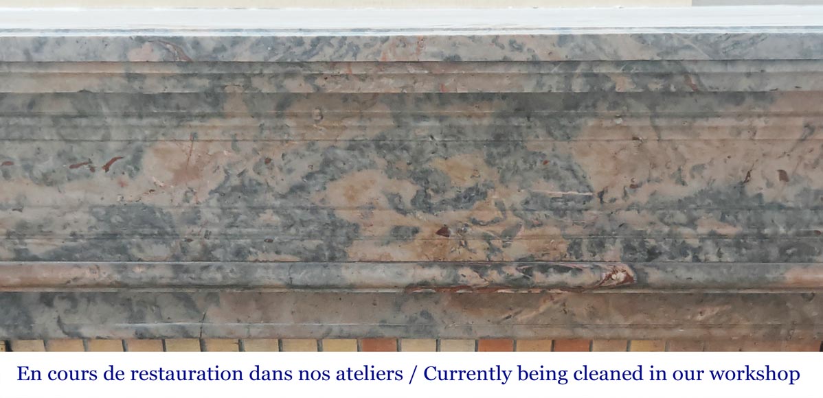 Cheminée de style Louis XVI aux pieds cannelés , en marbre rose enjugerais-1